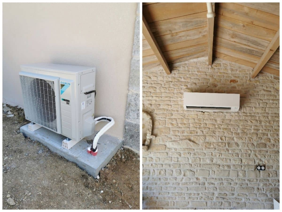 Groupe extérieur Daikin sur socle et unité murale posée sur un mur en pierre